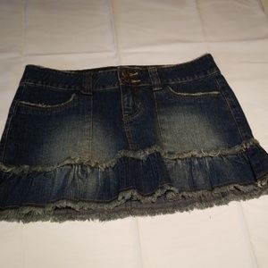 Really cute denim jean skirt with frayed edges